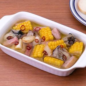 牡蠣ととうもろこしとベーコンのアヒージョ