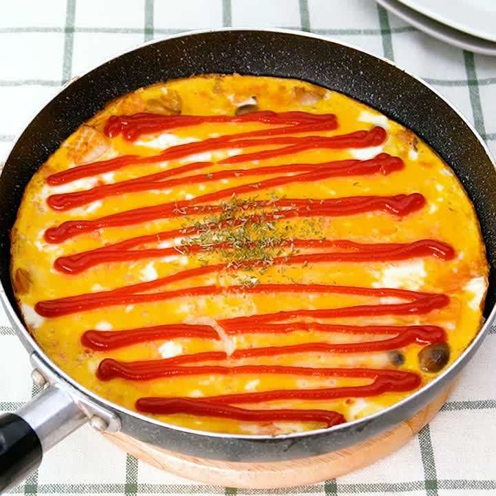 シーフードのワンパンチーズオムライス